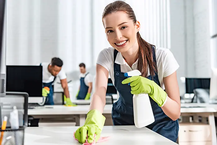 Office cleaning crew cleaning a commercial office
